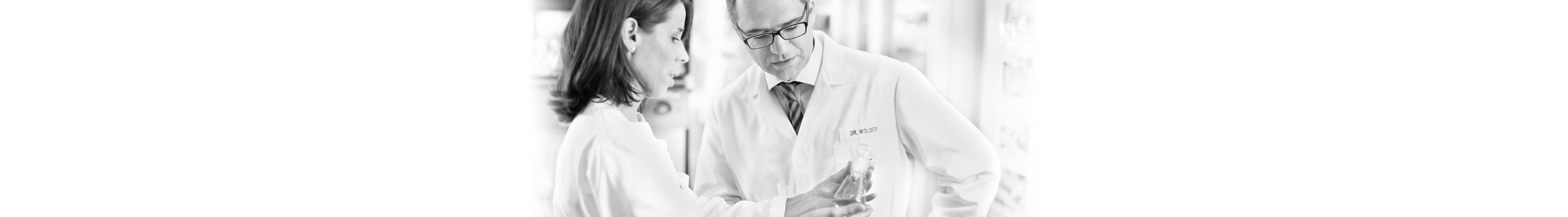 Dr. Rainer Wolber, Head of Product Development, DermoCosmetics is talking to a skincare scientist