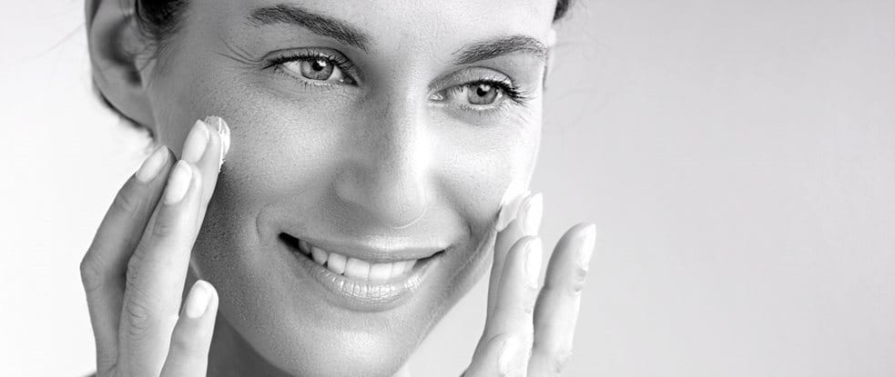 Woman using cream