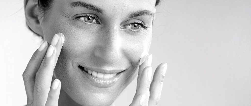 Woman using cream