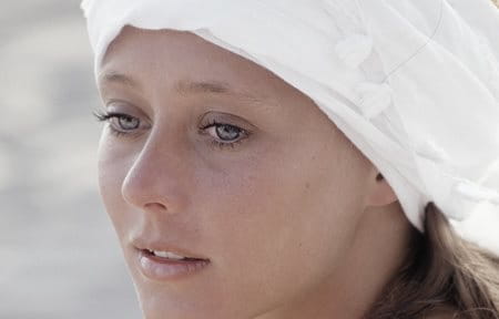 Younger woman's face exposed to UV rays