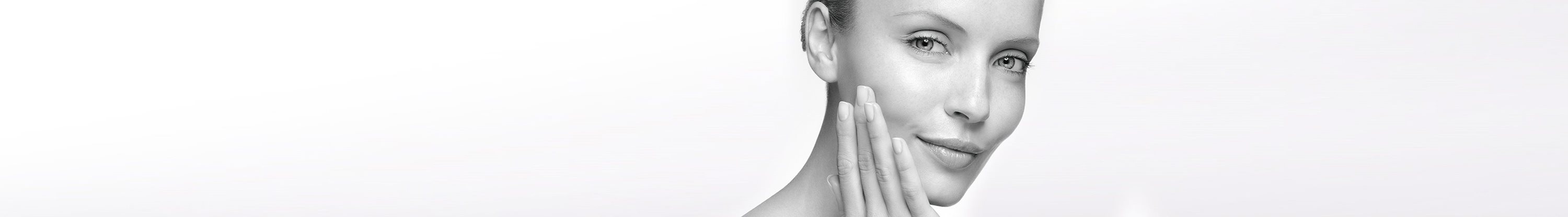 Woman with hypersensitive skin touching her face